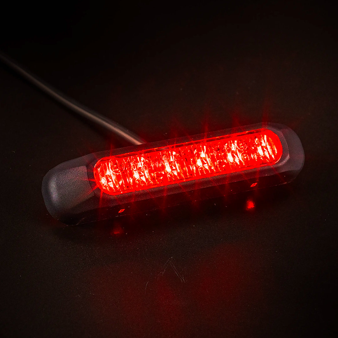Luce stroboscopica LED Fristom con lente fumé scuro/Rosso