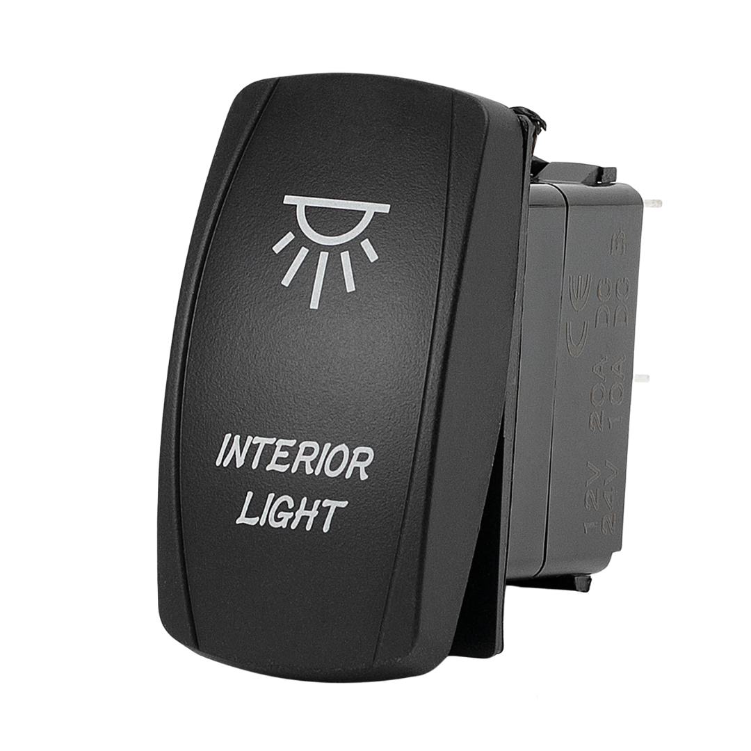 A black plastic automotive interior light switch with a white sun icon and the text 'INTERIOR LIGHT' printed on the front, shown against a plain white background.