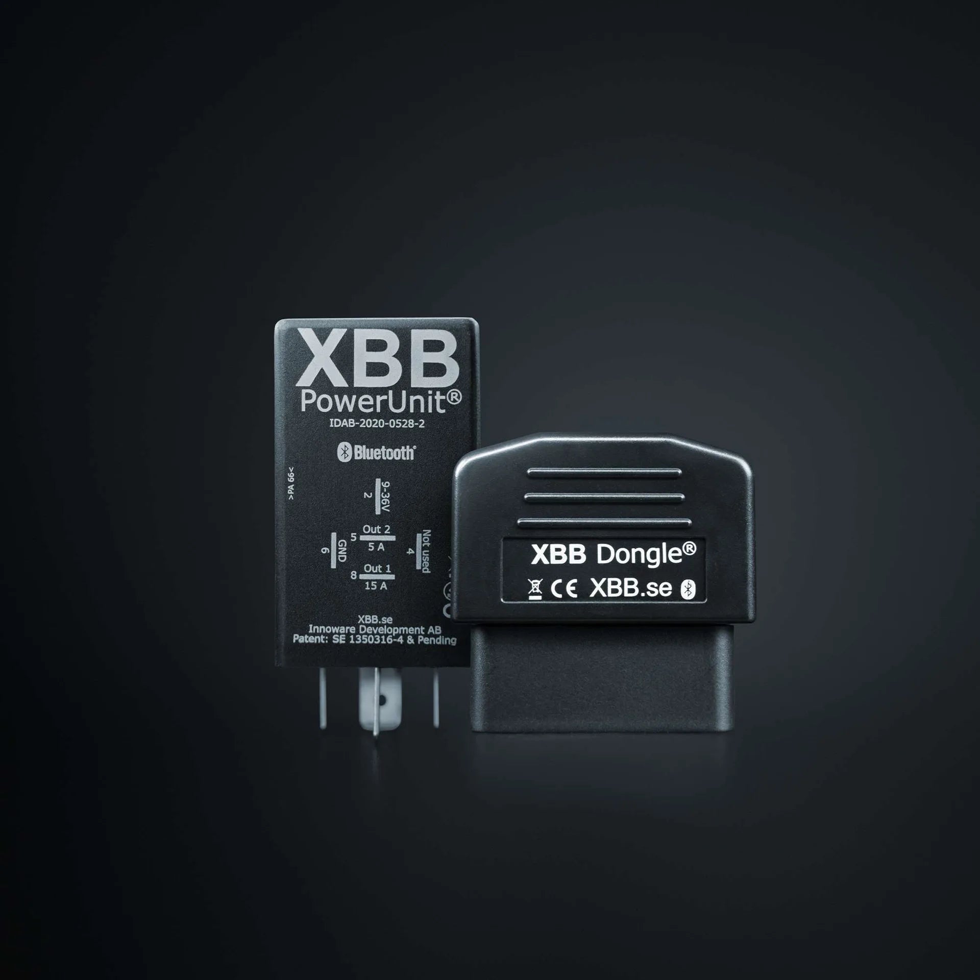 XBB PowerUnit and XBB Dongle on a black background