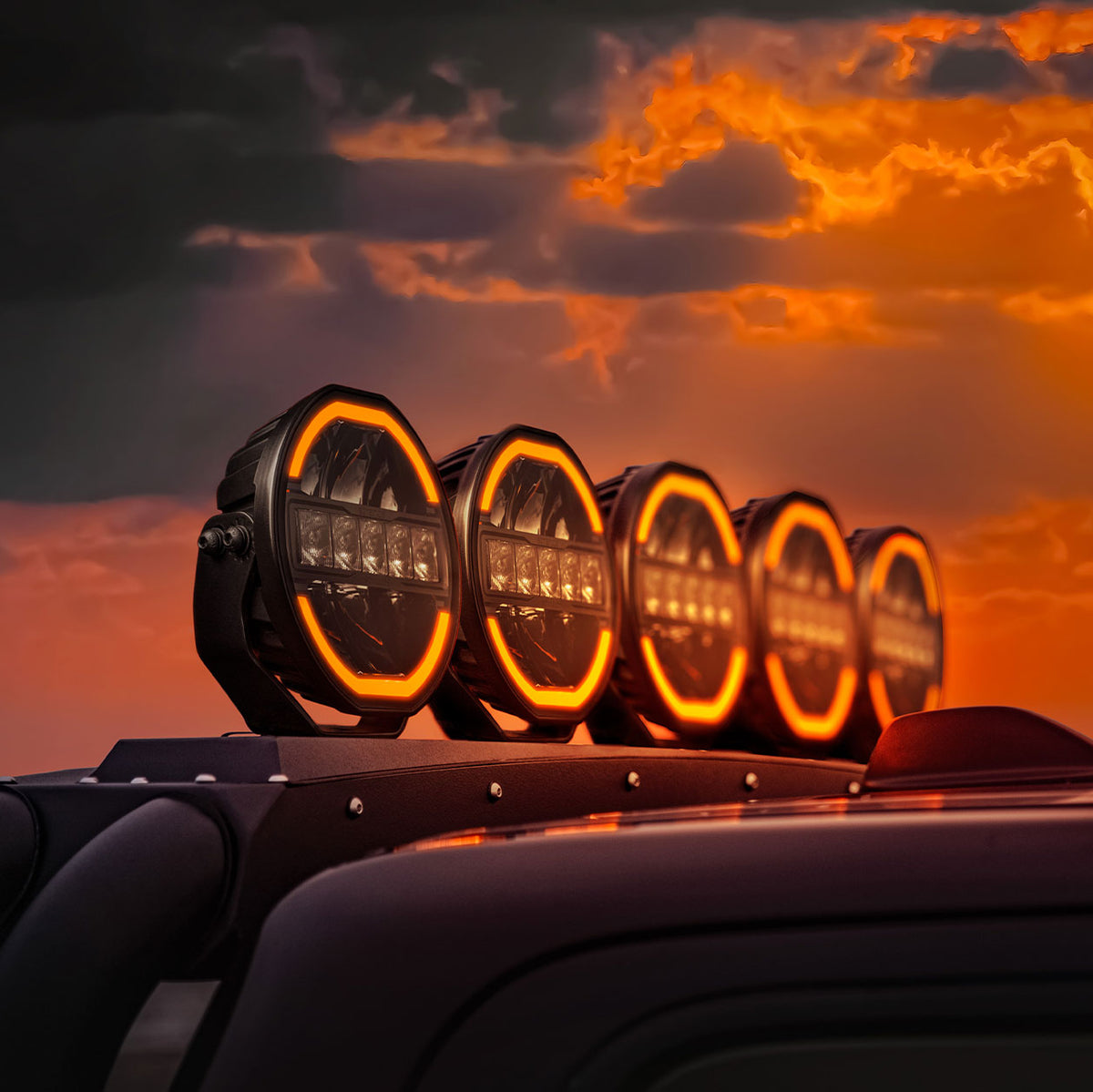 skylord 7 inch driving lights mounted on a roll bar of jeep 4x4