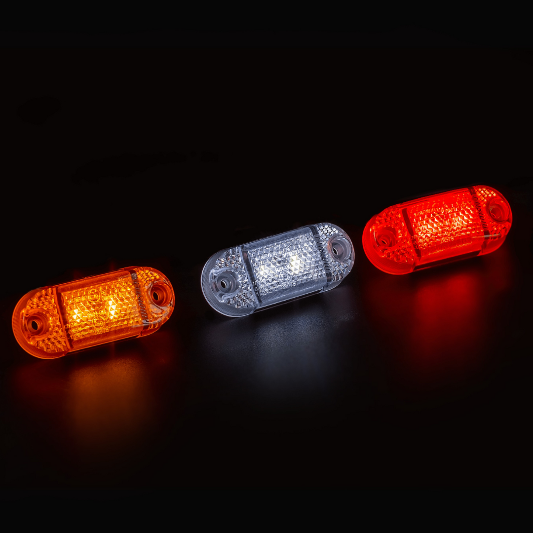 Fristom FT-062 Small LED Marker Lights on black background lit up