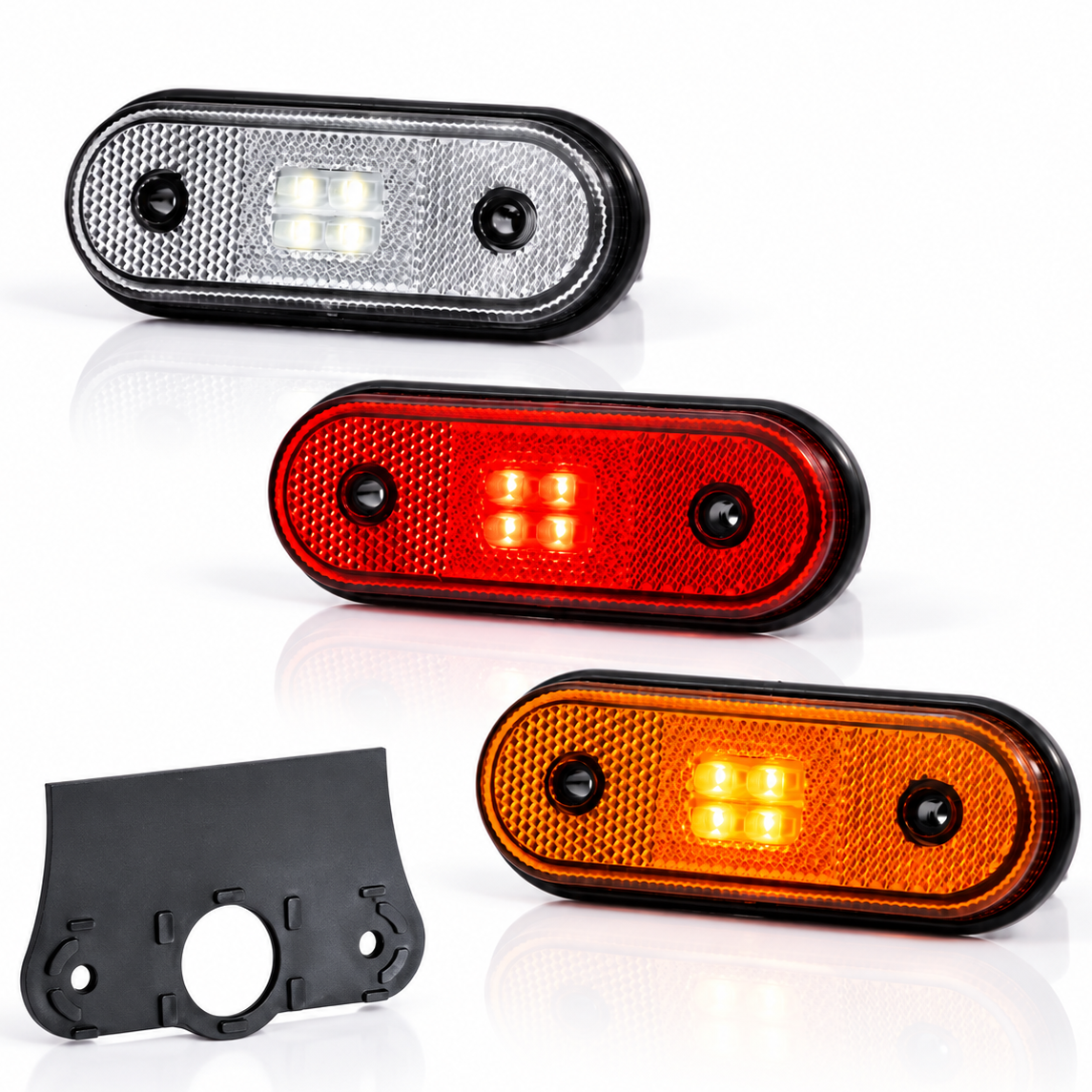 Tres unidades de luces ovaladas Fristom para remolque con carcasa negra, mostradas con lentes blancas, rojas y ámbar, además de un soporte de montaje negro sobre un fondo blanco limpio.
