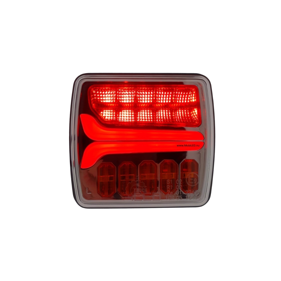 Red tail light on a white background